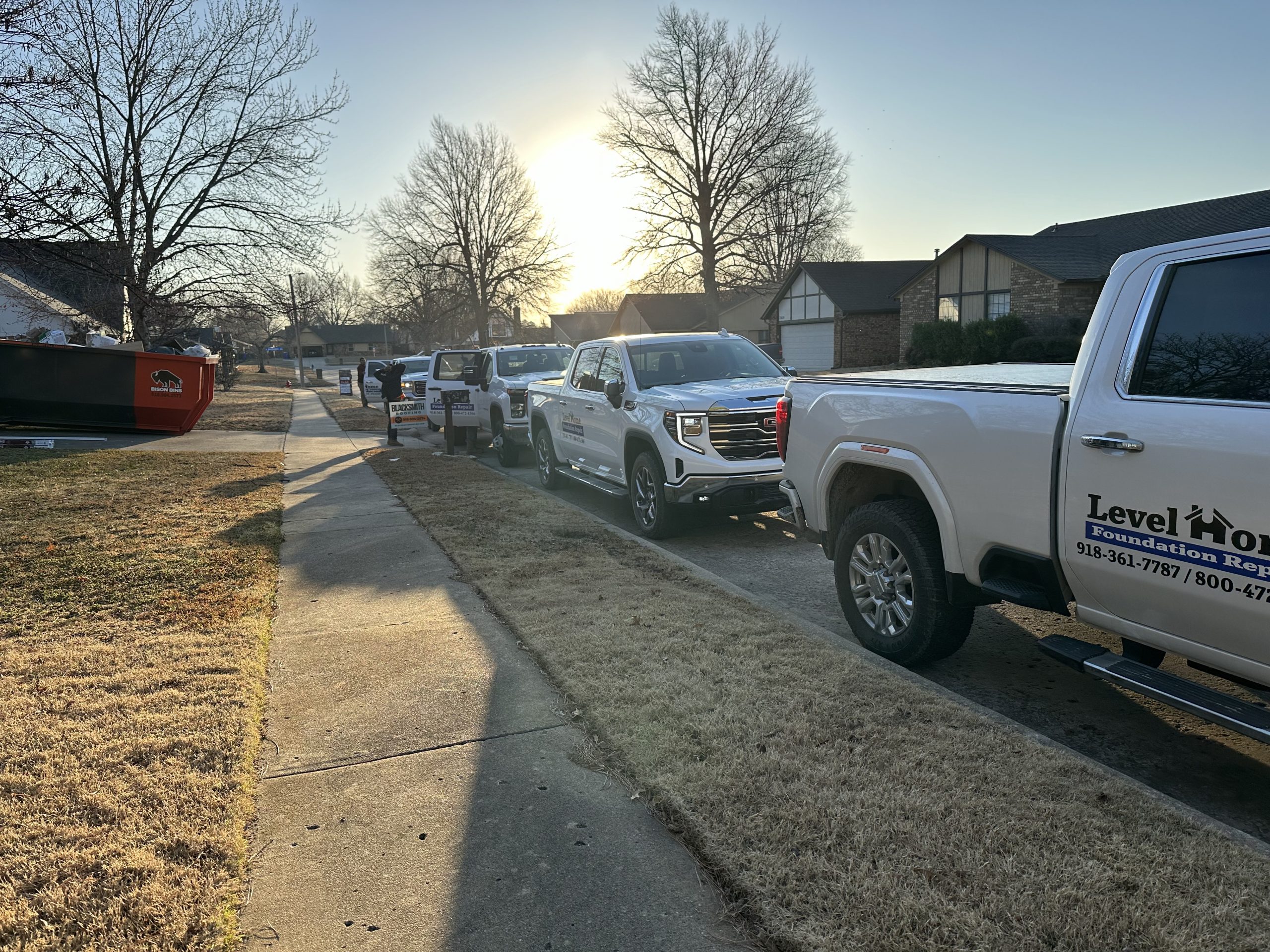 Foundation repair progress showing pier installation to stabilize a settled foundation in Tulsa