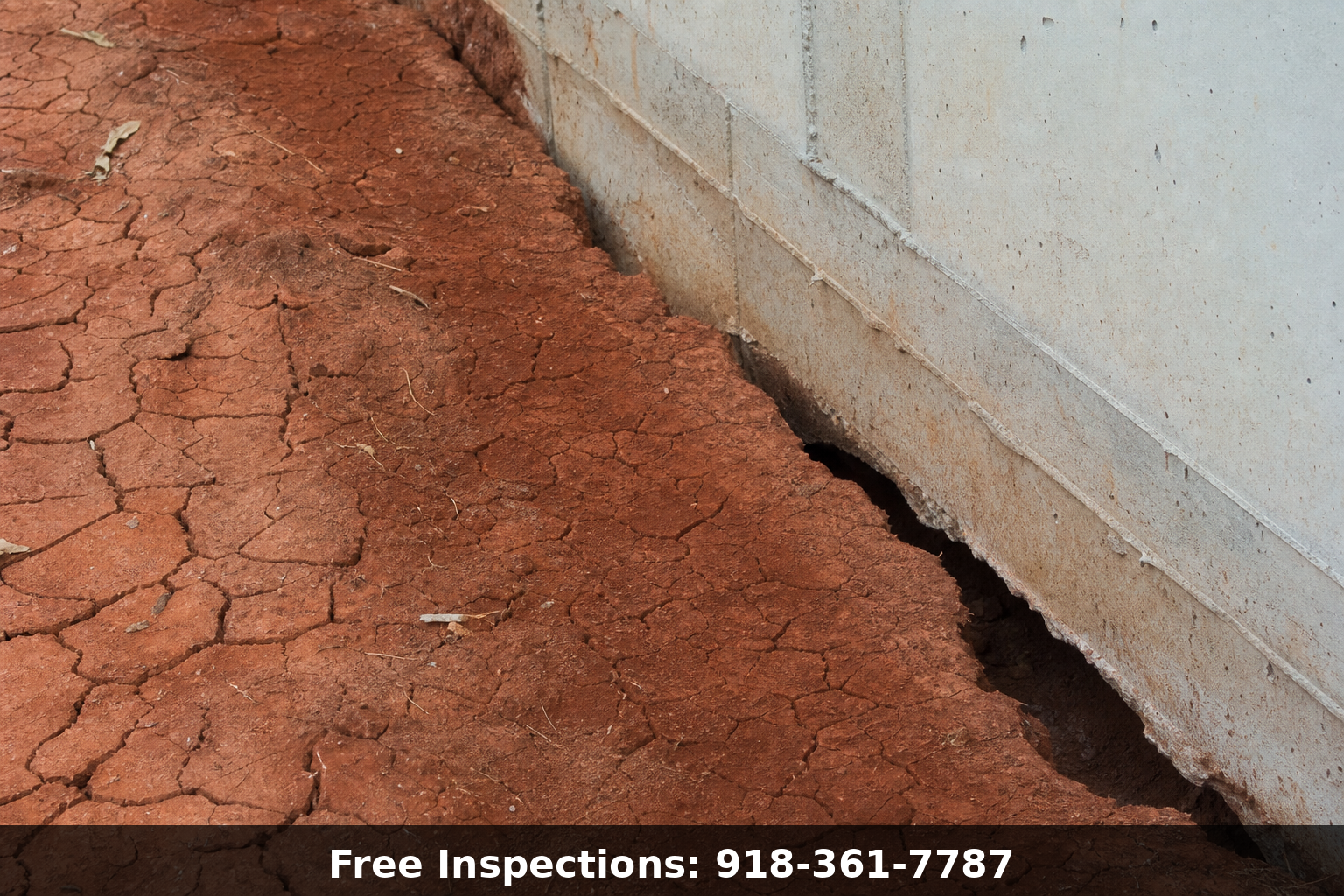 Oklahoma red clay soil cracking and pulling away from a home foundation wall causing foundation settlement in Tulsa