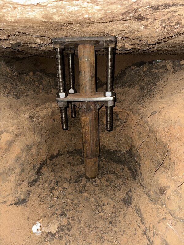 custom steel pier bracket designed and manufactured by Level Home Foundation Repair Tulsa Oklahoma