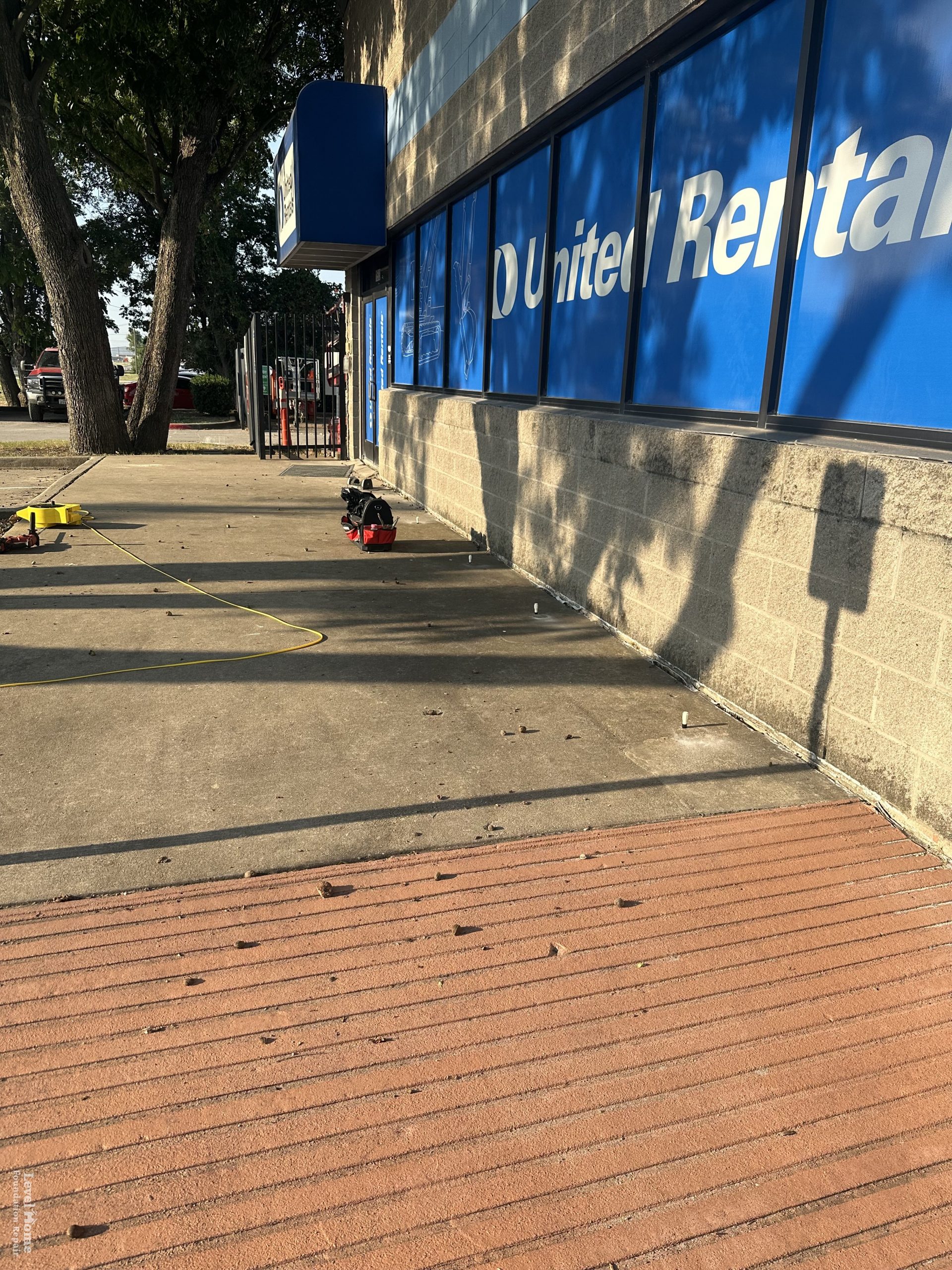 Retail storefront concrete repair work performed for United Rentals in Tulsa Oklahoma