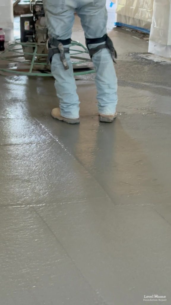 Interior slab replacement in progress at a Tulsa investment property by Level Home Foundation Repair showing concrete removal and structural wall support