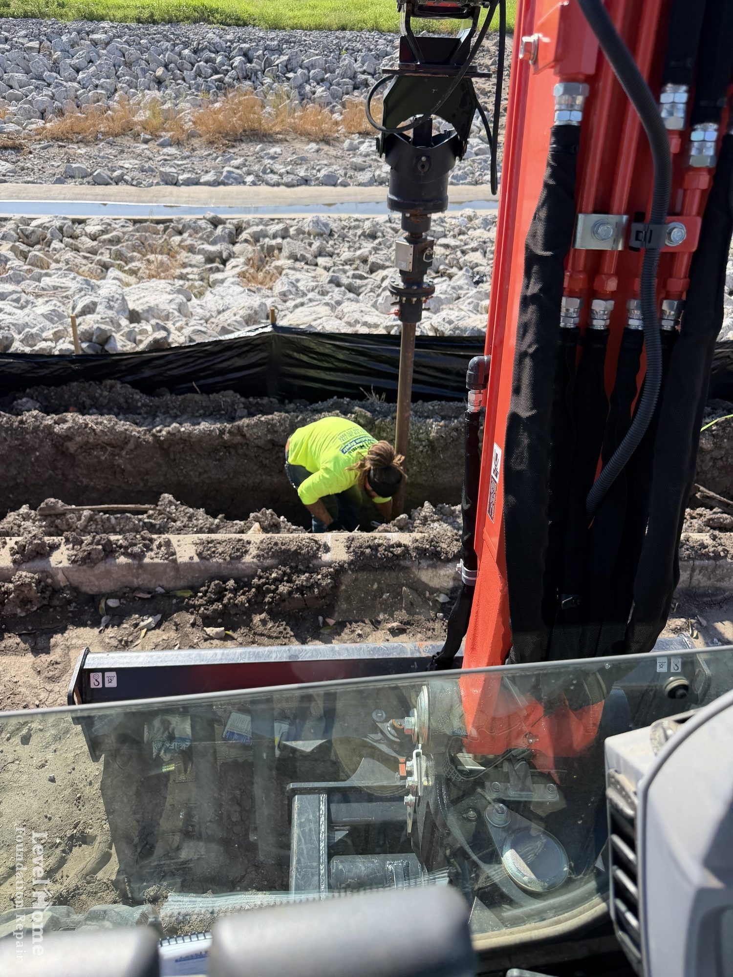 Commercial helical piers installed for Tulsa retaining wall at Tulsa Firefighters Credit Union